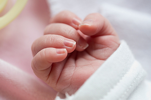 Hand of a female baby